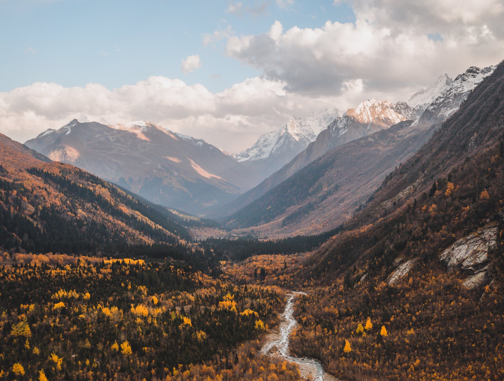 valley between mountains in autumn